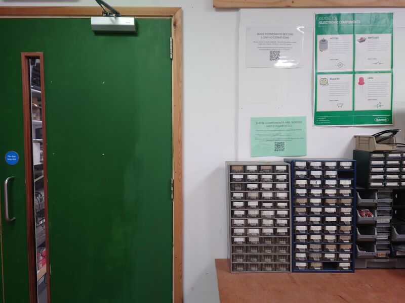 File:ICs rack next to blue room door.jpg