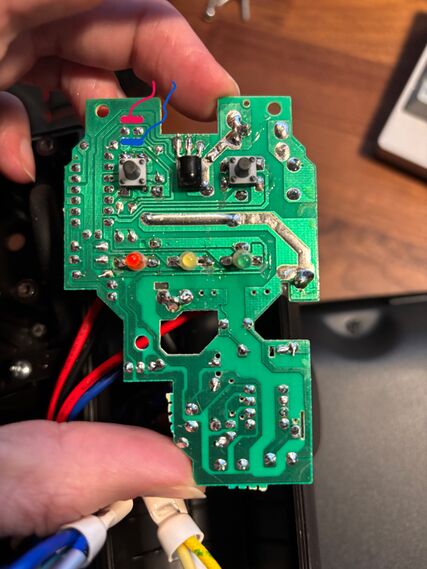 Trace side, showing how the emitter and collector pads from the where the transistors were have been tied together with wires running off to nh-tools.