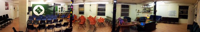 The main Studio of Nottingham Hackspace with the seating arranged for a talk.